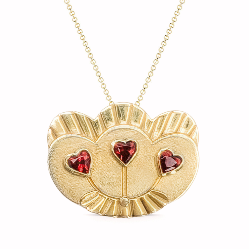Mother's Treasure pendant with heart shaped garnets in extra